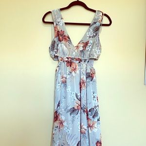 Elegant floral print midi dress with waist cutouts